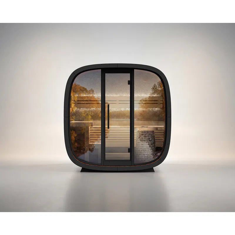 Leil Round Cube Mini Gartensauna 4 Personen von Leil Saunas mit schwarzem Rahmen, Holzinnenausstattung und großen Glasfenstern