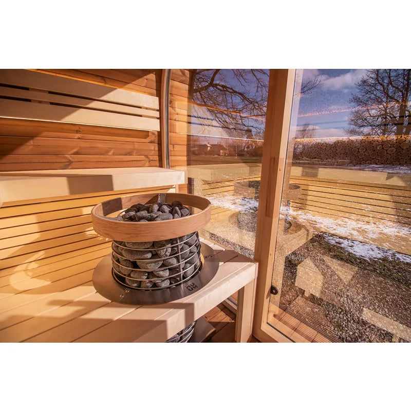 Leil® Round Cube Relax Gartensauna 6 Personen von Leil® Saunas mit Saunaofen und Holzbänken im Innenraum