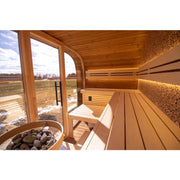 Leil® Round Cube Relax Gartensauna 6 Personen von Leil® Saunas mit Holzbänken, Saunaofen und großem Fenster zur Landschaft