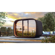 Leil® Round Cube Relax – Gartensauna 6 Personen mit schwarzem Design und großen Panoramafenstern in modernem Garten