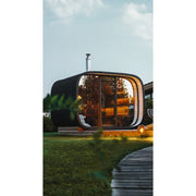 Leil Round Cube Single – Premium Gartensauna 1 Raum von Leil Saunas mit beleuchteter Holzinnenausstattung im Garten