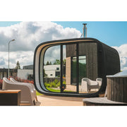 Leil Round Cube Single – Premium Gartensauna 1 Raum mit rundlichem Design, großen Fensterpartien und Holzverkleidung im Garten
