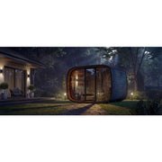 Leil Round Cube Single Premium Gartensauna 1 Raum mit abgerundeter Form im Garten, beleuchtet am Abend