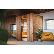 Leil® Saunas Como 4-180 Innensauna für 4 Personen mit Holzverkleidung in modernem Wohnraum