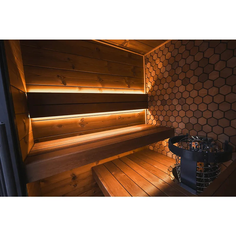 Leil® Viva 180 – 4 Personen Gartensauna Innenraum mit beleuchteten Holzbänken und Saunaofen