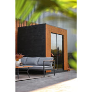 Leil® Viva 210 Gartensauna 4 Personen mit Liege von Leil® Saunas im Garten mit Lounge-Bereich