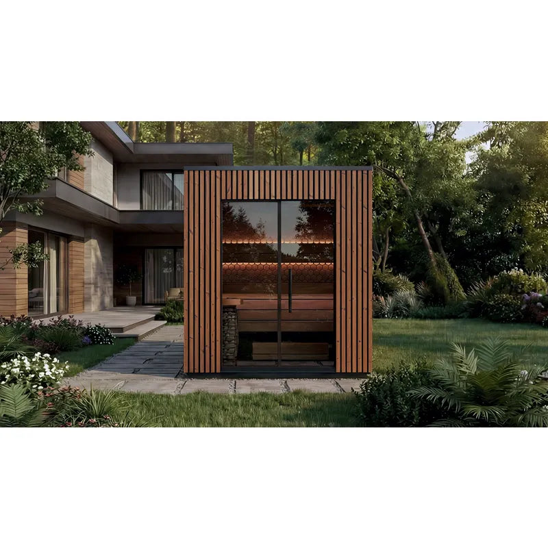 Leil® Viva 210 Gartensauna 4 Personen mit Liege von Leil® Saunas in modernem Garten neben Wohnhaus