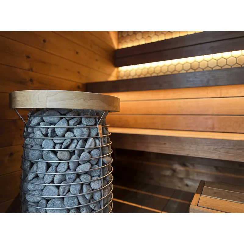 Leil® Viva 250 Gartensauna Innenraum mit Holzbänken, Saunaofen und Saunasteinen