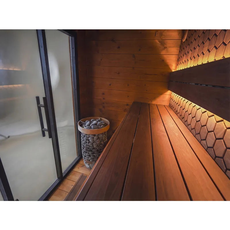 Leil® Viva 250 Gartensauna Innenraum mit Holzbänken, Glasfront und Saunaofen