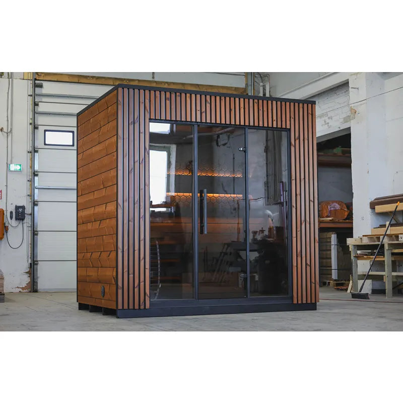 Leil® Viva 250 Gartensauna 4 Personen XL mit Glasfront von Leil® Saunas in Werkstatt, Holzfassade mit Glasfront