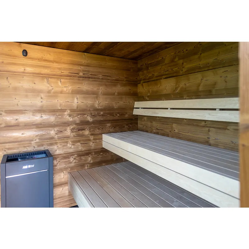 Nordik Wellness Signature L Premium-Gartensauna Innenraum mit Holzbänken und Saunaofen