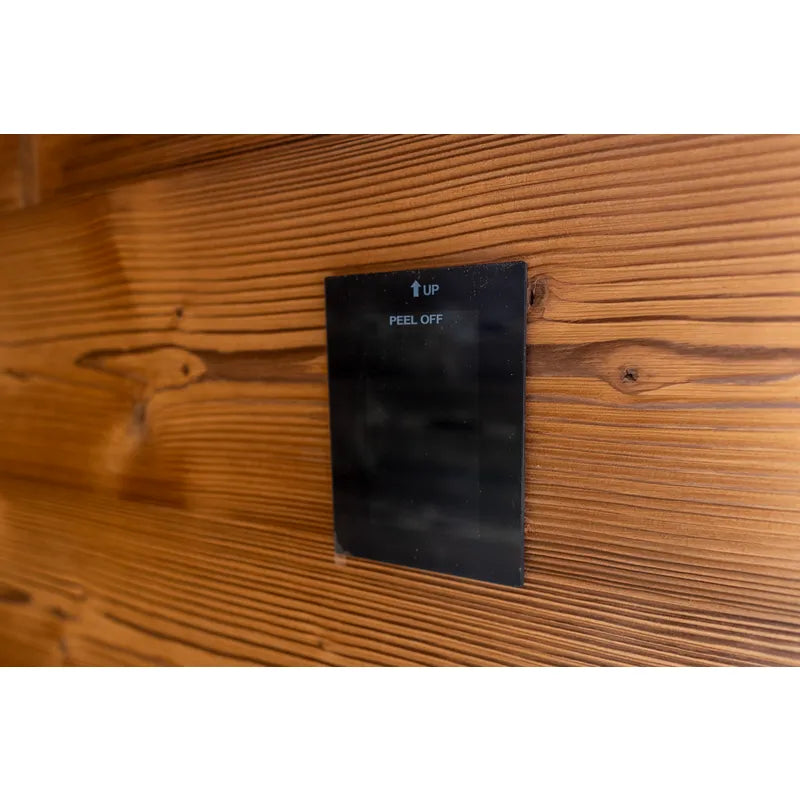 Nordik Wellness Signature L Gartensauna - Holzwand mit schwarzem Bedienfeld und UP/PEEL OFF Beschriftung