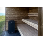 Nordik Wellness Signature L Premium-Gartensauna Innenraum mit Holzbänken und Saunaofen