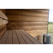 Nordik Wellness Signature M Gartensauna Innenraum mit Holzbänken und Saunaofen