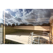 Nordik Wellness Signature M Kompakte Luxus-Gartensauna mit Holzverkleidung und Terrasse in Gartenlandschaft