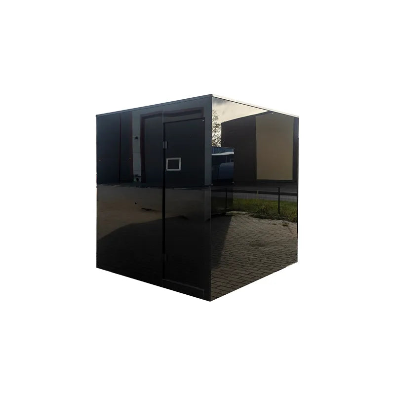 Nordik Wellness Signature M - Kompakte Luxus-Gartensauna mit schwarzer Glasfront und Holzboden im Garten