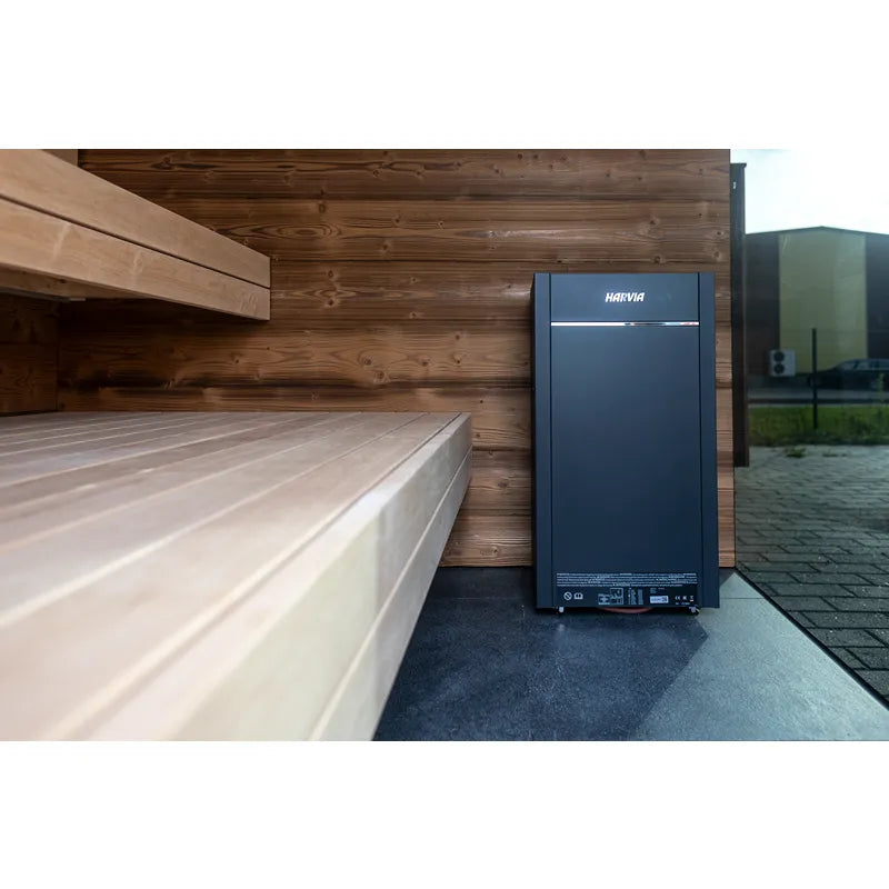 Nordik Wellness Signature M Kompakte Luxus-Gartensauna Innenraum mit Holzbänken und Harvia-Steuerung