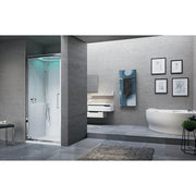 Modernes Badezimmer mit integrierter Novellini EON G Dampfdusche in Nischeneinbau mit Beleuchtung und Drehtür, neben freistehender Badewanne und Wandgestaltung in Betonoptik.