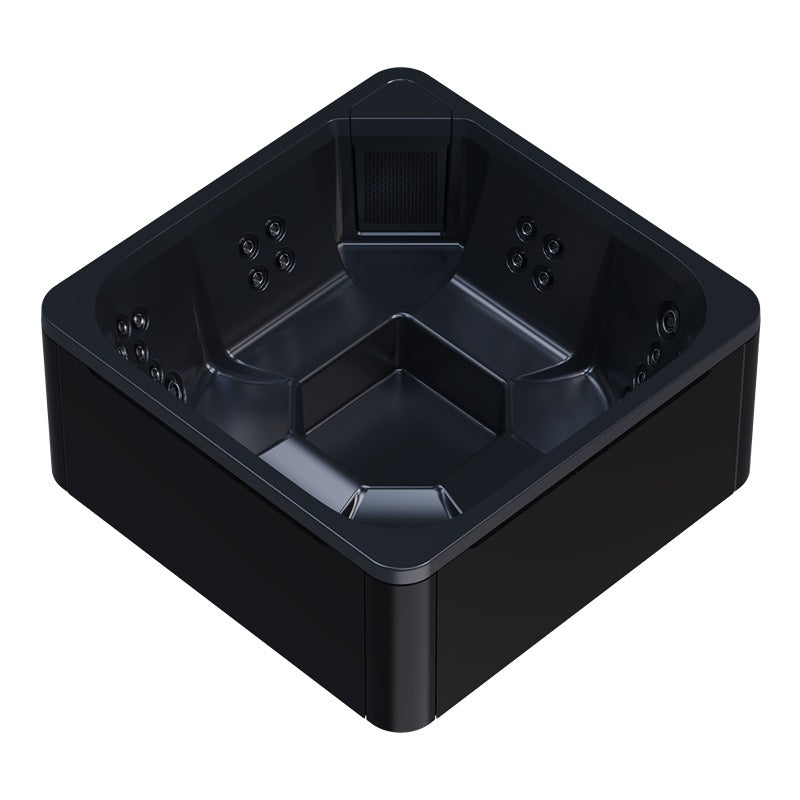 Quadratischer Novitek M-0 Outdoor Whirlpool in Schwarz von oben, mit Massagedüsen an den Seiten und zentraler Rückenlehne, für 7 Personen.