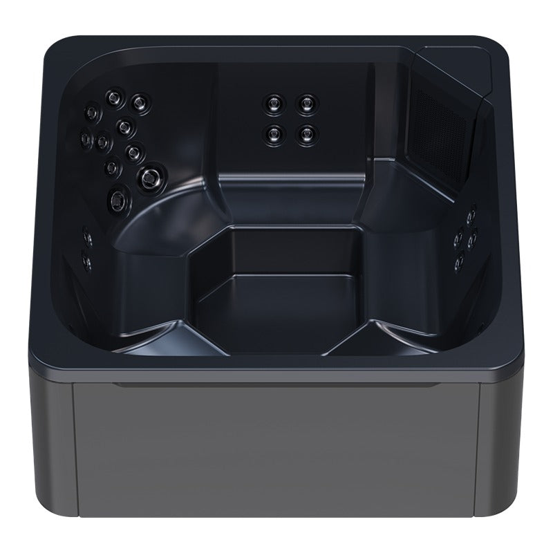 Novitek M-0 Outdoor Whirlpool von oben mit schwarzem Innenraum, Massagedüsen an den Wänden und Bedienfeld, graues Außengehäuse