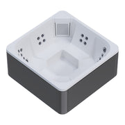 Novitek M-0 Outdoor Whirlpool mit weißem Innenbereich, anthrazitfarbenem Außengehäuse, mehreren Massagedüsen und integriertem Lüftungsgitter von oben