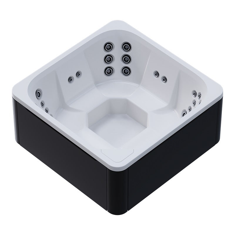 Novitek M-0 Outdoor Whirlpool in Weiß und Schwarz mit quadratischem Design, ausgestattet mit mehreren Massagedüsen an allen Seiten, von oben betrachtet