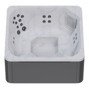 Novitek M-0 Outdoor Whirlpool in Weiß mit grauem Sockel, Draufsicht mit Massagedüsen und Lufteinlässen