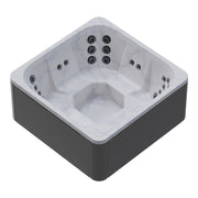 Novitek M-0 Whirlpool mit weißem Innenaufbau und dunkelgrauem Außenpaneel von oben, ausgestattet mit mehreren Massagedüsen an allen Seiten
