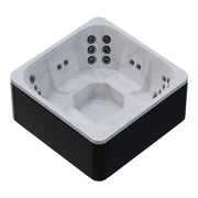 Novitek M-0 Outdoor Whirlpool in Weiß-Schwarz mit quadratischem Design, zahlreichen Massagedüsen an allen Seiten und integrierter Sitzbank für 7 Personen