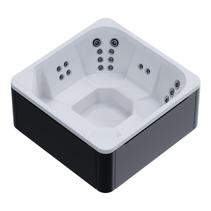 Novitek M-0 Outdoor Whirlpool in Weiß und Schwarz von oben mit Massagedüsen und Sitzplätzen für 7 Personen
