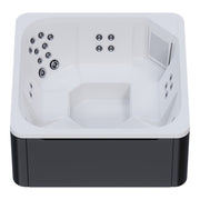Novitek M-0 Outdoor Whirlpool von oben, weiße Innenausstattung mit mehreren Massagedüsen an den Seiten, schwarzes Außengehäuse, Platz für 7 Personen