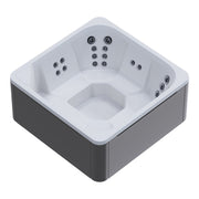 Novitek M-0 Outdoor Whirlpool in quadratischer Form mit weißem Innenbereich, grauen Seitenwänden und mehreren Massagedüsen an allen Seiten von oben fotografiert.