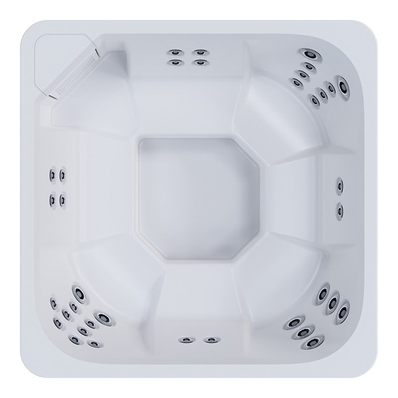 Draufsicht auf den Novitek M-0 Outdoor Whirlpool in Weiß mit quadratischem Design, mehreren Massagedüsen an allen Seiten und zentralem Sitzbereich für 7 Personen