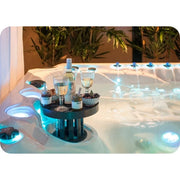 Passion Spas Activity 2 Swim Spa für 3 Personen mit LED-Beleuchtung, Whirlpool-Funktion und Getränketisch im Garten