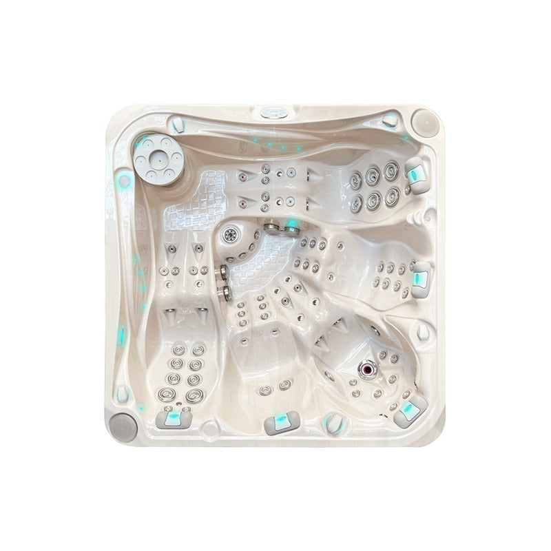 Innenansicht des Passion Spas Devotion Whirlpools mit ergonomischen Sitz- und Liegeplätzen