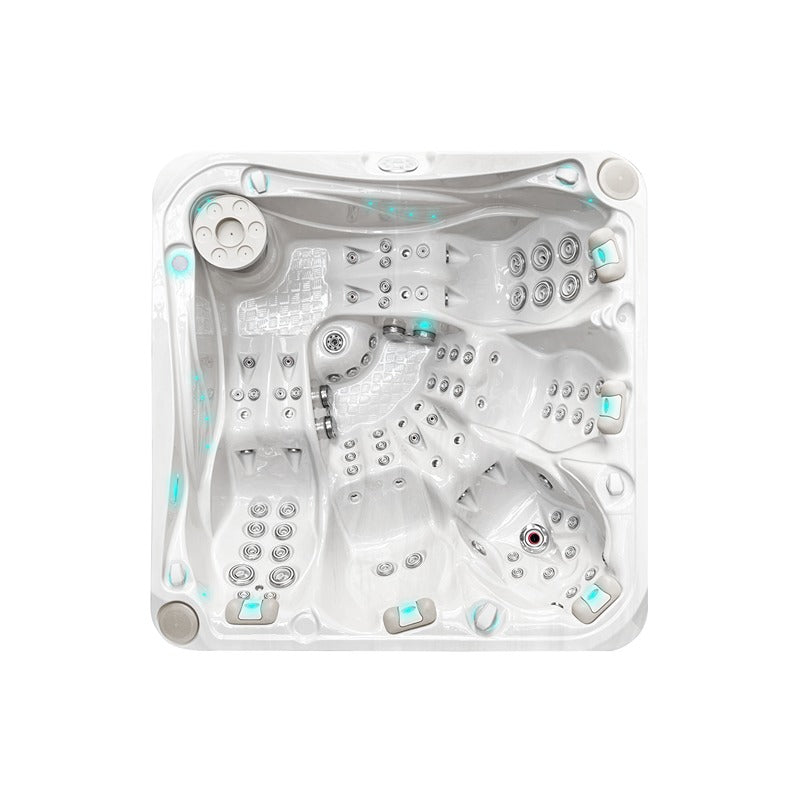 Topansicht des Passion Spas Devotion Whirlpools mit differenzierten Massagezonen und LED-Akzenten