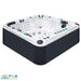  Seitliche Außenansicht des Passion Spas Exhilarate Mighty Wave Whirlpool mit hochwertiger Verkleidung in Anthrazit, klar definierten Massageplätzen und ergonomischem Wannenaufbau.