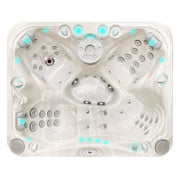 Passion Spas Happy Whirlpool von oben mit großzügiger Platzaufteilung, leuchtenden LEDs und Massagedüsen in cremefarbener Ausführung