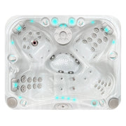 Draufsicht des Passion Spas Happy Whirlpools mit symmetrischem Sitzkonzept, Jetdüsen und Fußmassage-Zone in grauer Wanne