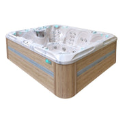 Passion Spas Harmony Whirlpool mit Holzverkleidung, weißem Wannenrand und Massagedüsen für 9 Personen, Draufsicht.