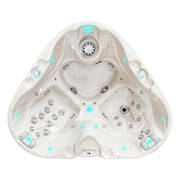 Draufsicht des Passion Spas Heart Whirlpools in Creme mit herzförmigem Fußbereich, LED-Spots und Massagedüsen