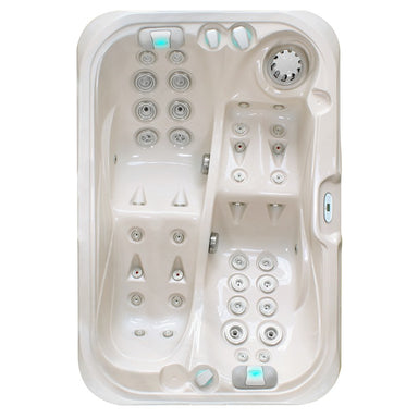 Draufsicht des Passion Spas Indulgence Whirlpools mit zwei Liegen, kraftvollen Massagedüsen und entspannender Fußzone