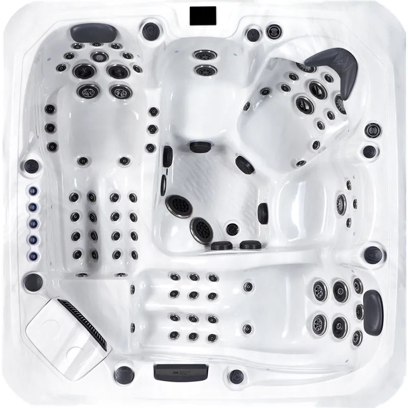 Platinum Spas Barcelona Whirlpool von oben, weiße Wanne mit schwarzen Düsen und ergonomischen Sitzplätzen für 5 Personen