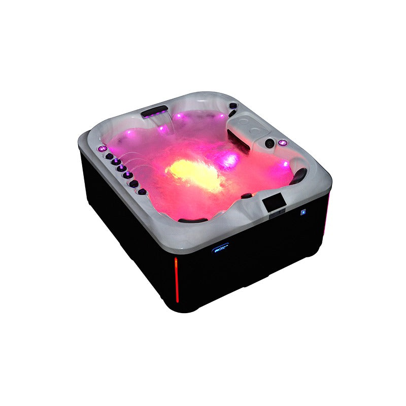 Platinum Spas Capri Luxury Hot Tub mit farbiger LED-Beleuchtung bei Nacht – stimmungsvolles Lichterspiel für entspannende Wellnessmoment