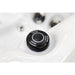 Platinum Spas Happy Whirlpool – Nahaufnahme des schwarzen ON/OFF-Drehreglers auf weißer Acryloberfläche