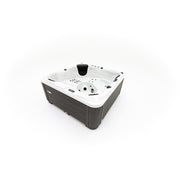 Whirlpool Platinum Spas Happy Deluxe – schräge Seitenansicht mit sichtbarer Steuerung und Massagedüsen