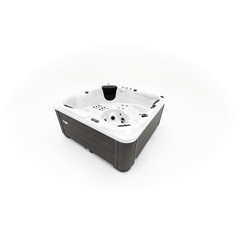 Whirlpool Platinum Spas Happy Deluxe – schräge Seitenansicht mit sichtbarer Steuerung und Massagedüsen