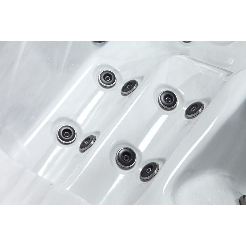 Detailansicht der ergonomisch angeordneten Hydrotherapie-Jets im Platinum Spas Kenya Hot Tub – hochwertige Acryloberfläche in edler Marmoroptik für gezielte Rückenmassage.