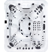 Draufsicht auf den Platinum Spas Maximus Outdoor Whirlpool in Weiß mit zahlreichen Düsen, Sitzbereichen für 6 Personen und schwarzen Akzenten