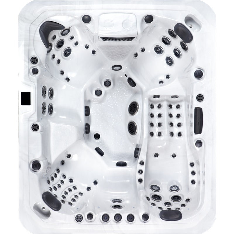 Draufsicht auf den Platinum Spas Maximus Outdoor Whirlpool in Weiß mit zahlreichen Düsen, Sitzbereichen für 6 Personen und schwarzen Akzenten